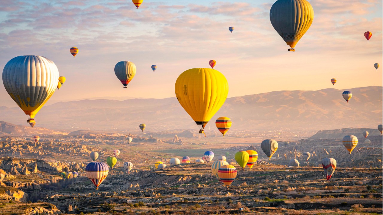 Aerial view of Hot air balloons at sunrise. Goreme, Cappadocia, Turkey